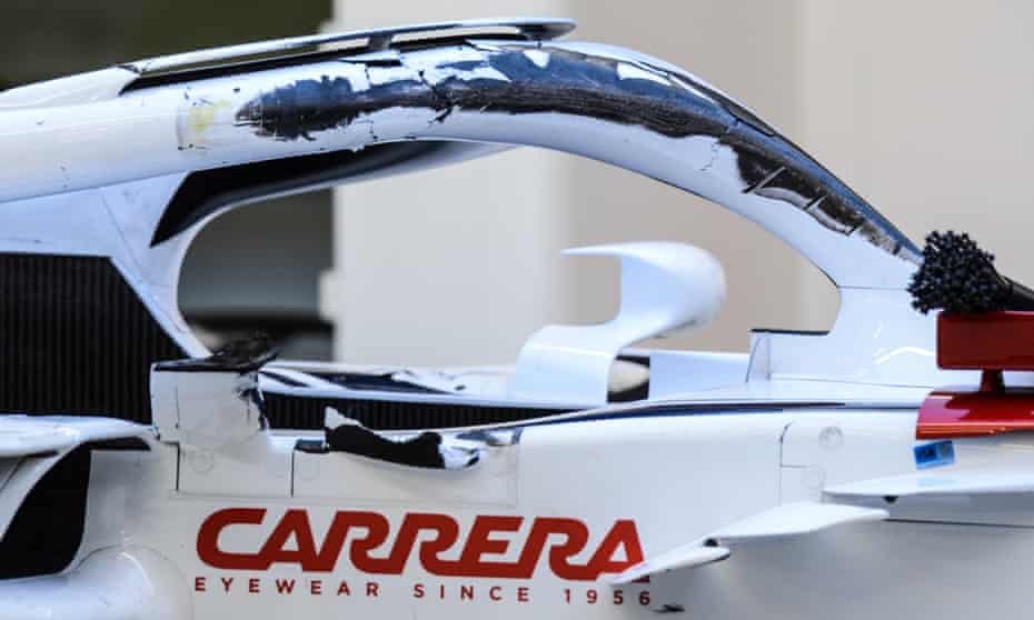 Charles Leclerc’s halo device shows damage from the impact with Fernando Alonso.