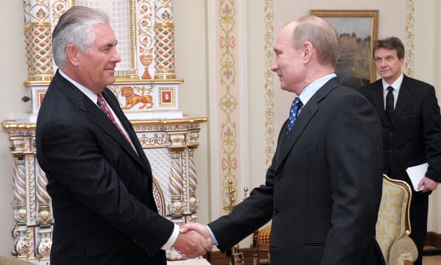 Vladimir Putin and Rex Tillerson shaking hands