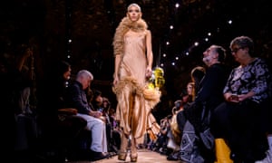 A world of glamour: a runway model wearing a Michael Kors gown at New York Fashion Week in February.