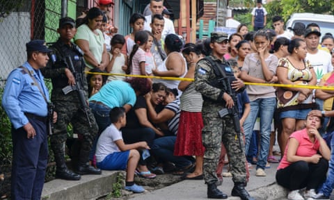A woman and other relatives of a bus driver who was killed in Tegucigalpa, Honduras, by alleged gang members for refusing to pay them a ‘war tax’.