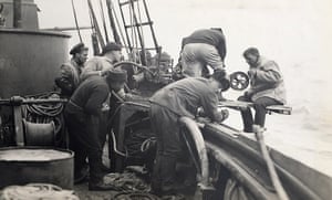 Aboard the Quest, the last expedition of Sir Ernest Shackleton. This image displays one of the inspired knacks Wilkins possessed in his photography; to capture an image just as one participant – here the sailor in the front right - is looking towards the camera. 1921-22 Courtesy of the State Library of New South Wales