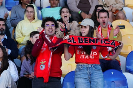 Benfica fans cheer on their team during their game against Paris St-Germain.