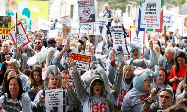 Protesters in London in 2016. Thousands of demonstrators took part in marches around the world.
