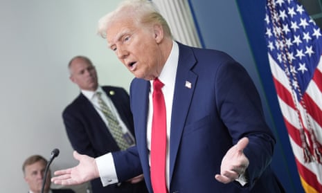 Trump at the briefing. Trump at the briefing.