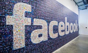 facebook logo on a wall