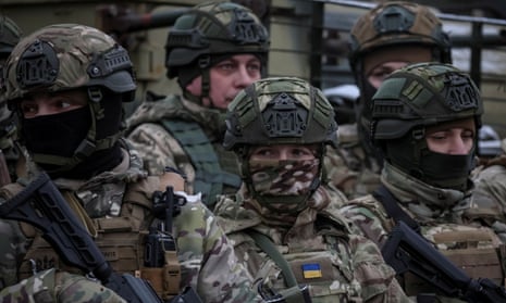 Ukrainian soldiers at a joint drills of armed forces, national guard and Security Service of Ukraine (SBU) near the border with Belarus.