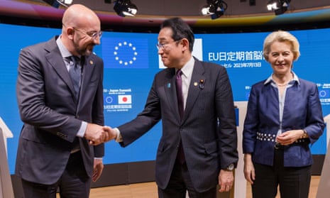 Japan's prime minister Fumio Kishida, walks with European commission president Ursula von der Leyen and European council president Charles Michel.