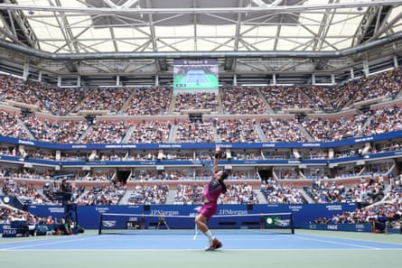 Jack Draper serves to Jannik Sinner during their US Open men's singles semi-final.