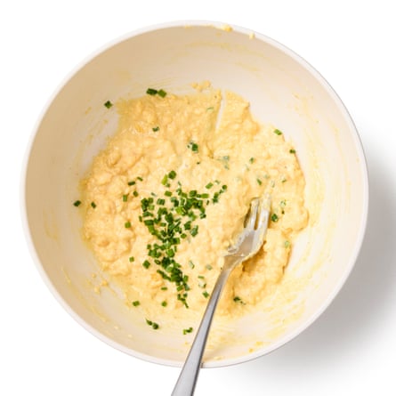 Felicity Cloake’s devilled eggs 07a. 7 Add the mashed egg yolk. Stir in the crumbled egg yolk. Finely chop the chives, stir into the mix, then taste and adjust the seasoning, if necessary.