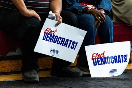 people holding signs