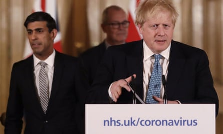 Britain’s chancellor, Rishi Sunak, left, and the prime minister, Boris Johnson, at a coronavirus press briefing.