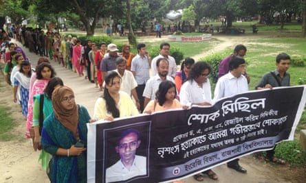 Students and teachers march through the campus of Rajshahi university to protest the murder of English professor Rezaul Karim Siddiquee.