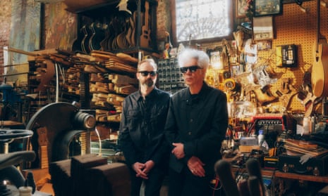 (From left) Carter Logan and Jim Jarmusch, AKA Sqürl, photographed in Carmine Street Guitars in New York.