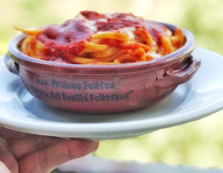 earthenware bowl with pasta in open air