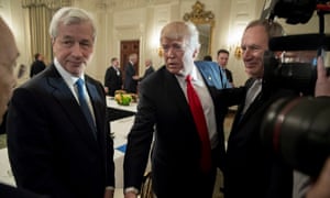 Donald Trump greets business leaders beside president and CEO of JP Morgan Jamie Dimon, at the White House in 2017.