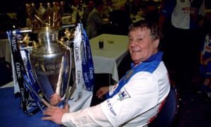 Jack Walker has a moment with the Premier League trophy after the presentation.