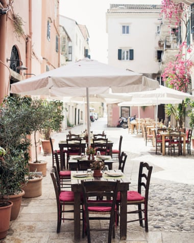 Dining out: tables outside the excellent backstreet restaurants (try the grilled fish).