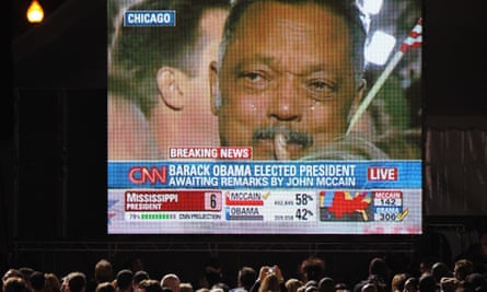The image of a weeping Rev Jesse Jackson is projected on to a large screen as CNN announces the victory of Barack Obama on 4 November 2008.