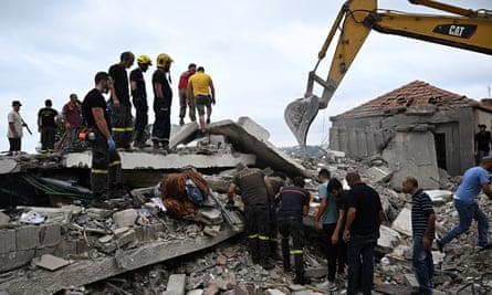 Lebanese civil defence workers clear debris at the site of an Israeli airstrike on the Mount Lebanon village of Maaysra on Saturday.