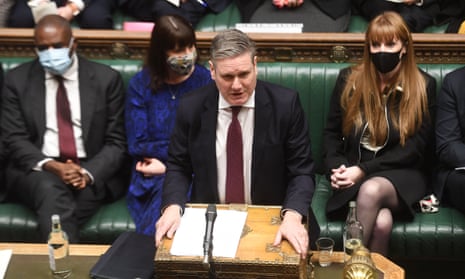 Labour Party leader Keir Starmer (C) attending Prime Minister's Questions in the House of Commons.