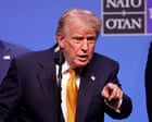 Sabre-rattling to ‘tremendous love’: erratic Trump dominates final hours of Nato summit