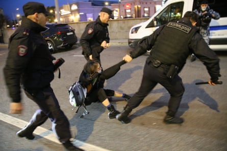Anti-mobilisation protester is arrested in Moscow on 21 September