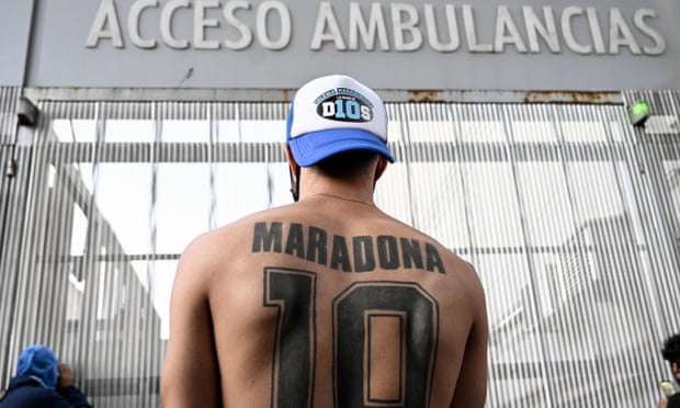 A Diego Maradona fan outside the hospital where the former Argentina interntional had surgery.