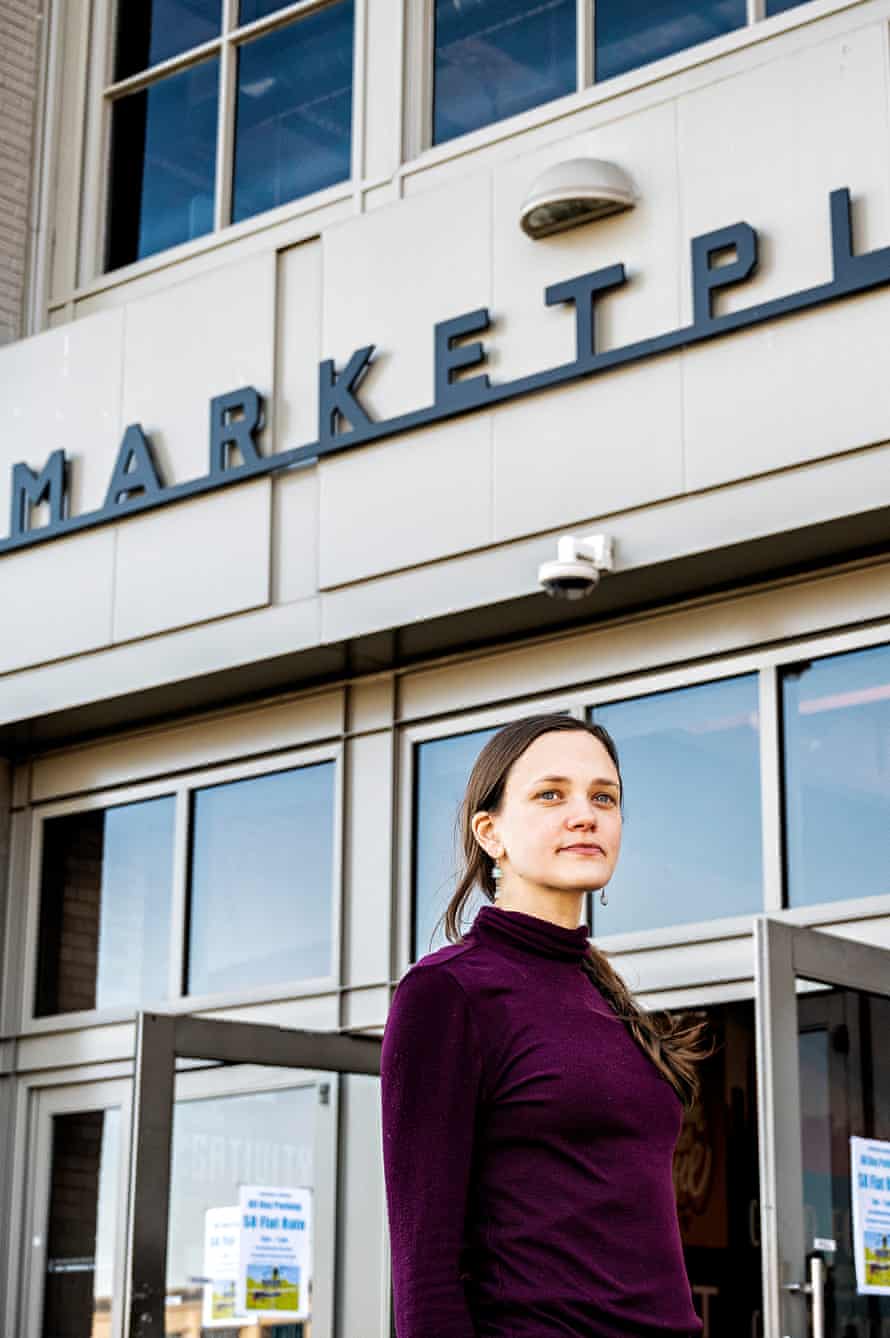Alex Mart of Stonehouse Olive Oil stands outside the marketplace