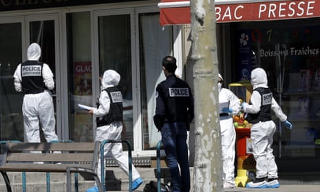 French investigators at the scene of attack after a man stabbed several people in Romans-sur-Isère.
