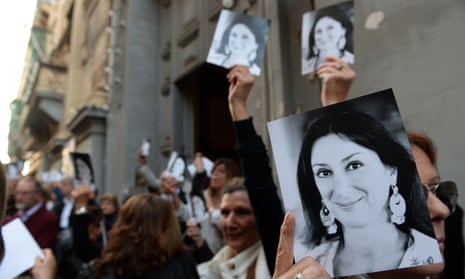 Supporters of Daphne Caruana Galizia leaving church in Valletta earlier this month