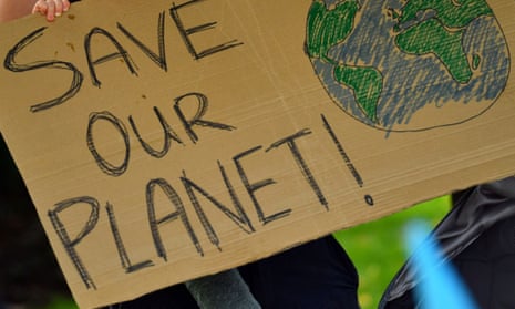A placard held by climate activists outside the Shell building in London in 2020.