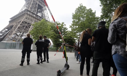 Police prevent tourists from entering the area surrounding the Eiffel Tower