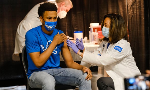 A group of teenagers serving as ‘Covid-19 student ambassadors’ joined Governor Gretchen Whitmer to receive a Pfizer vaccine in Detroit, Michigan in April.