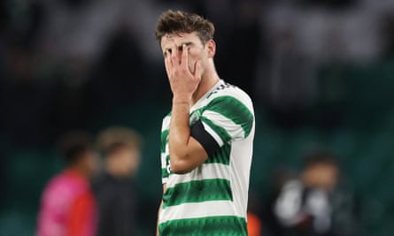 Celtic’s Matt O’Riley covers his face in despair after the match