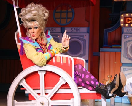 Paul O’Grady as Lily Savage and sitting in a chariot on stage