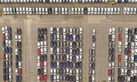 Recently assembled Vauxhall vehicles are stored in the distribution yard at the Vauxhall car factory in Ellesmere Port