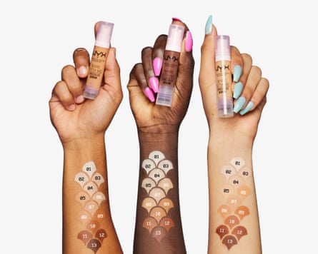Three hands each holding a NYX Professional Makeup Bare With Me Concealer Serum