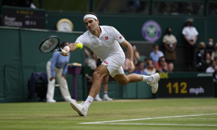 Roger Federer takes on Cameron Norrie at last year’s Wimbledon.