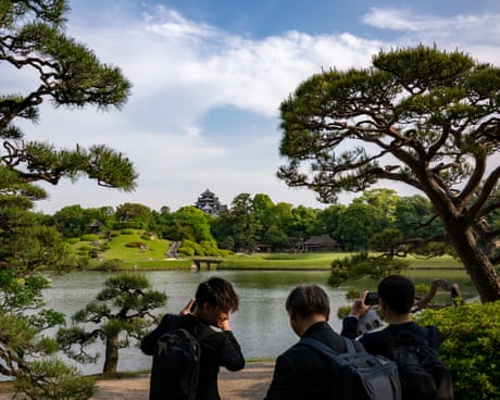 People visit Korakuen Garden in Okayama, Japan.