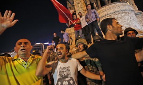 Supporters of Turkey’s president Recep Tayyip Erdoğan, protest in front of soldiers in Istanbul early Saturday, 16 July. 