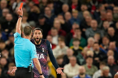 Tottenham's Rodrigo Bentancur is shown the red card.