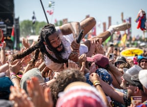 A horizontal Bob Vylan supported by the crowd