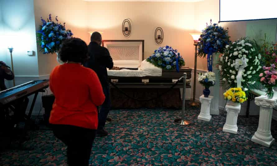 A funeral at Doty Nash funeral home in Chicago in April. Only 10 people were allowed inside.