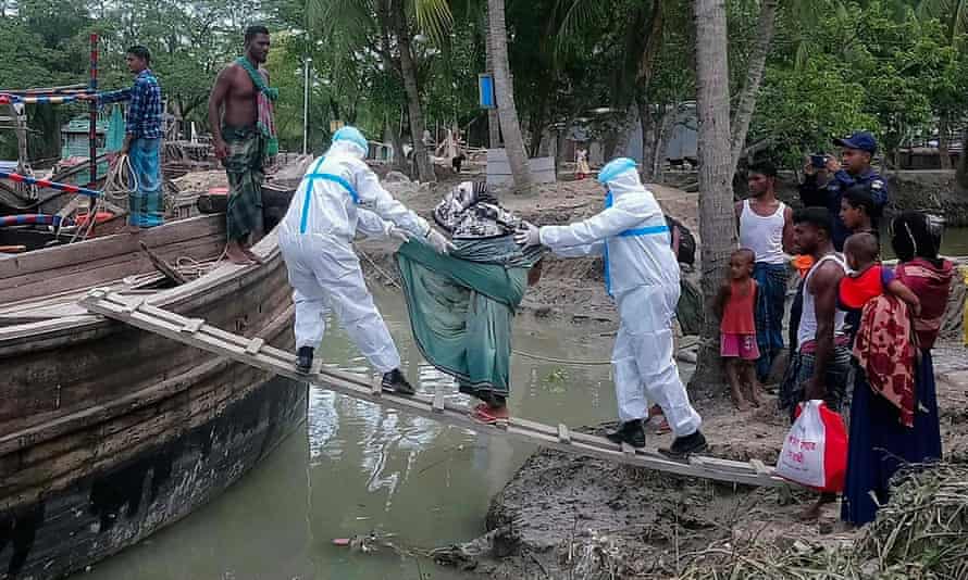 Residents of the island of Bhola, Bangladesh, are moved to safety