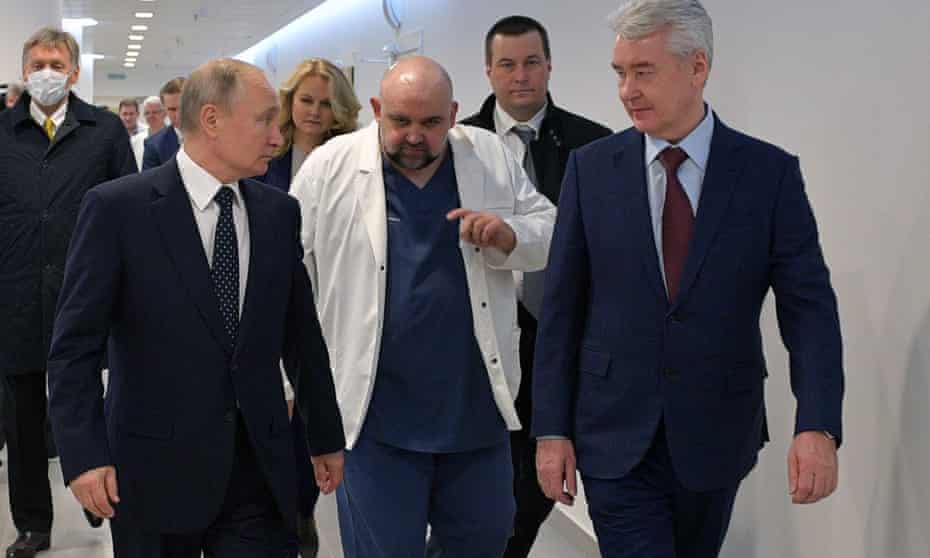 Russia’s president, Vladimir Putin, visits a medical facility in Kommunarka