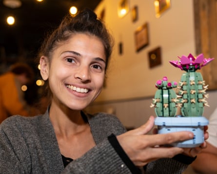 Loretta Piare with her completed Lego cactus.