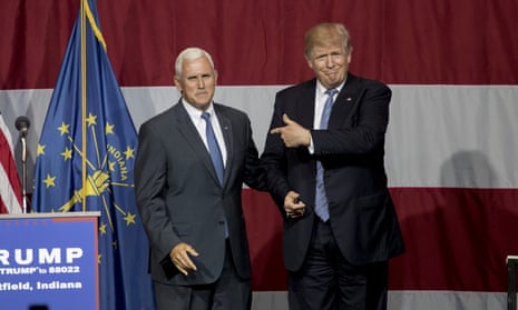 Republican presidential candidate Donald Trump greets Indiana governor Mike Pence at a rally in Westfield