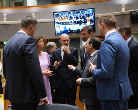 French Foreign Minister Jean-Noel Barrot, center, speaks with from left, Malta's Foreign Minister Ian Borg, Slovenia's Foreign Minister Tanja Fajon, Slovakia's Foreign Minister Juraj Blanar and Spain's Foreign Minister Jose Manuel Albares Bueno during a meeting of EU foreign ministers at the European Council building in Brussels.