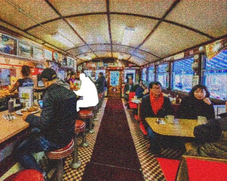 Silhouette of a person sitting at a diner counter with other customers around