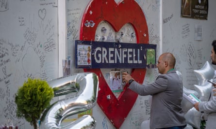 Hamid Ali Jafari at the tribute wall at Grenfell Tower on 14 June 2022, the fifth annniversary of the fire in which his father Ali Yawar Jafari died.